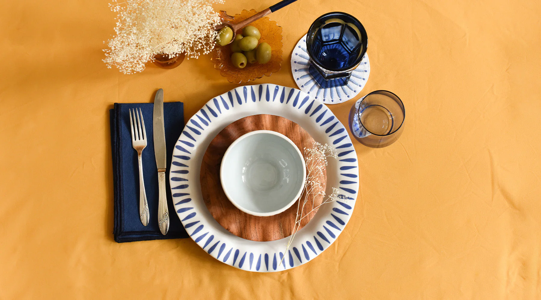 Soft illustration of a balanced, colourful meal arrangement on a calm table setting